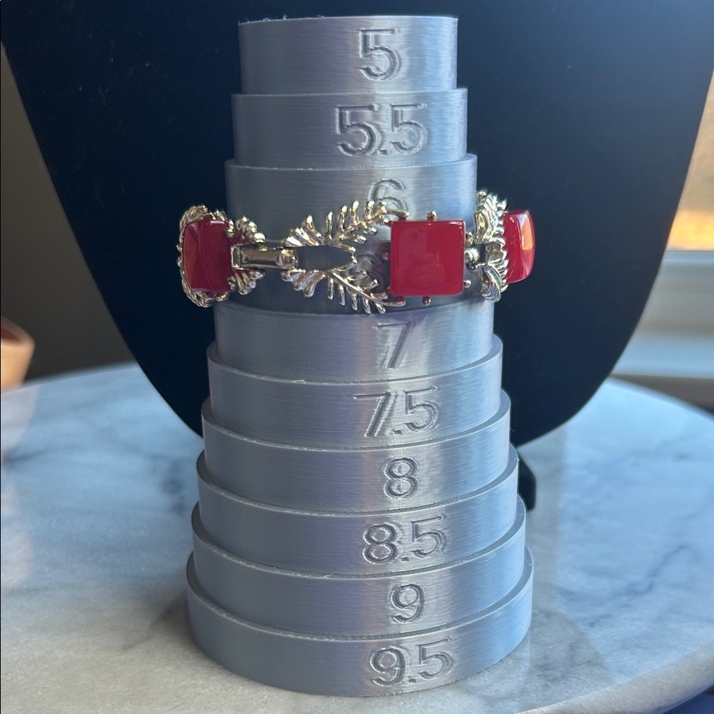 Coro bracelet with chiclet red lucite squares with gilt leaf motif fold over